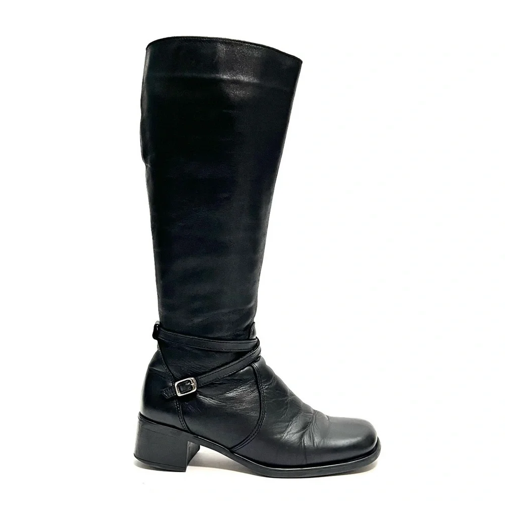Vintage 1990s black leather knee high wool lined heeled winter fashion boots